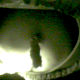 In this voyeur clip, a camera is positioned below an outhouse opening and records a woman struggling to shit. Probably taken on a camping trip.